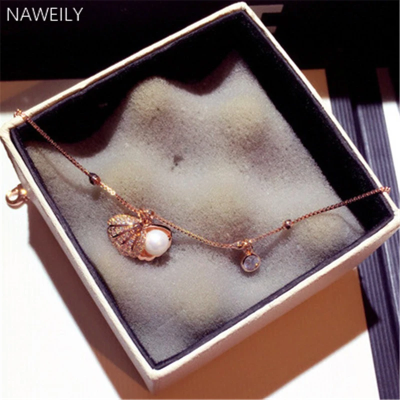 Fashion Pearl Shell Charm Bracelet & Bangles For Women Girls Gift Delicate Simulated Pearl Copper Chains Zircon Bracelets
Fashion Pearl Shell Charm Bracelet & Bangles For Women Girls Gift Delicate Simulated Pearl Copper Chains Zircon Bracelets