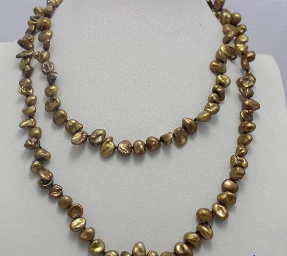 ~~ 11.21 Light Brown keshi reborn pearl long necklace 35INCH 7x9mm "handmade" no metal
~~ 11.21 Light Brown keshi reborn pearl long necklace 35INCH 7x9mm "handmade" no metal