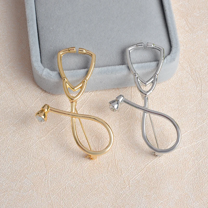 Hot! Creative Stethoscope Brooch Pins Nurse Doctor physicians Medical Student Gift European And American Film And Television Sur
Hot! Creative Stethoscope Brooch Pins Nurse Doctor physicians Medical Student Gift European And American Film And Television Sur