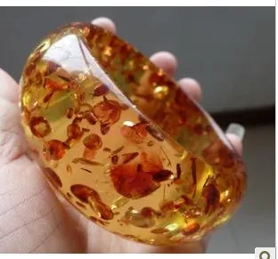 Beautiful fashion unique flavor of the natural amber flower amber bracelet for widening and thickening
Beautiful fashion unique flavor of the natural amber flower amber bracelet for widening and thickening