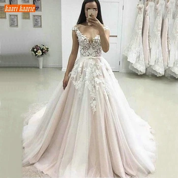 Gorgeous Boho Ivory Beach Wedding Dresses V Neck Tulle Appliques Lace Wedding Gowns Luscious Princess Sweep Train Bridal Dress
Gorgeous Boho Ivory Beach Wedding Dresses V Neck Tulle Appliques Lace Wedding Gowns Luscious Princess Sweep Train Bridal Dress
