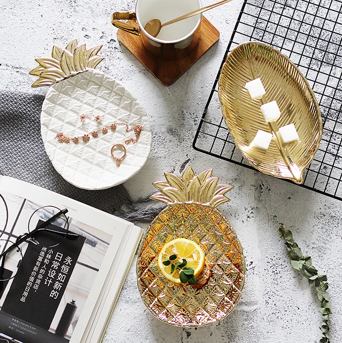 Nordic Electroplating Golden Pineapple Leaf Jewelry Storage Plate Dried Fruit Plate Dessert Dish Home Party Creative Tableware
Nordic Electroplating Golden Pineapple Leaf Jewelry Storage Plate Dried Fruit Plate Dessert Dish Home Party Creative Tableware