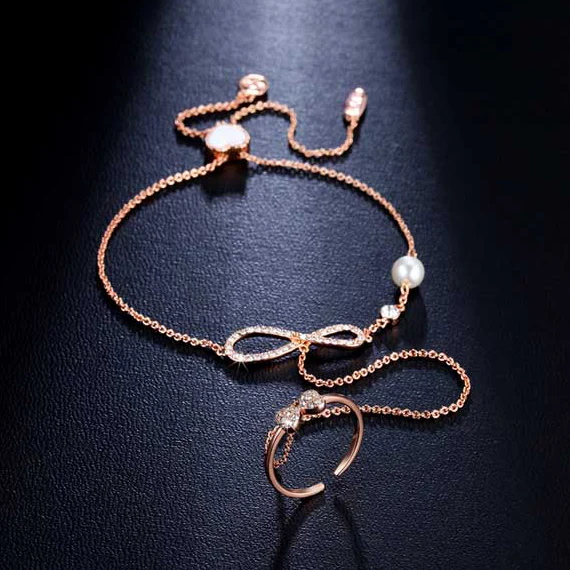 Fashion White & Champagne Gold Color Cubic Zirconia Finger Bowknot Hand Chain Harness bracelet Adjustable Slave Bracelet
Fashion White & Champagne Gold Color Cubic Zirconia Finger Bowknot Hand Chain Harness bracelet Adjustable Slave Bracelet