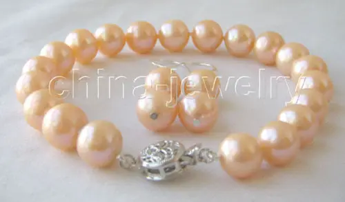 Beautiful AAA + 8" 10mm pink round freshwater pearl bracelet & earringNoble style Natural Fine jewe Fast (D) SHIPPING
Beautiful AAA + 8" 10mm pink round freshwater pearl bracelet & earringNoble style Natural Fine jewe Fast (D) SHIPPING