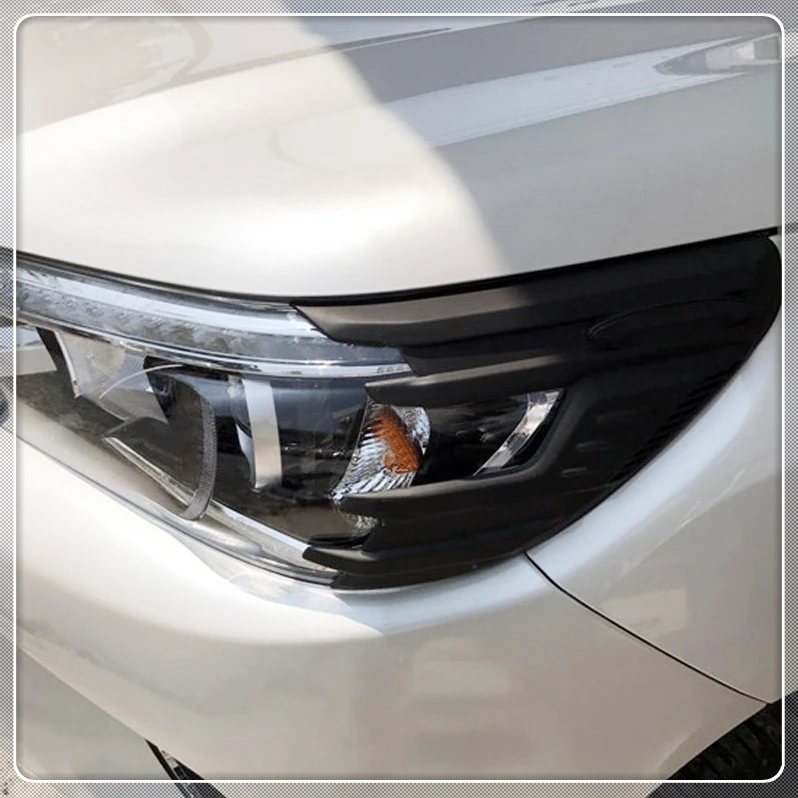For Toyota Hilux Revo 2016 2017 2018 ABS Plastic Black Front Head Light Eyebrow Cover Trim 2 pieces Car Accessories
For Toyota Hilux Revo 2016 2017 2018 ABS Plastic Black Front Head Light Eyebrow Cover Trim 2 pieces Car Accessories