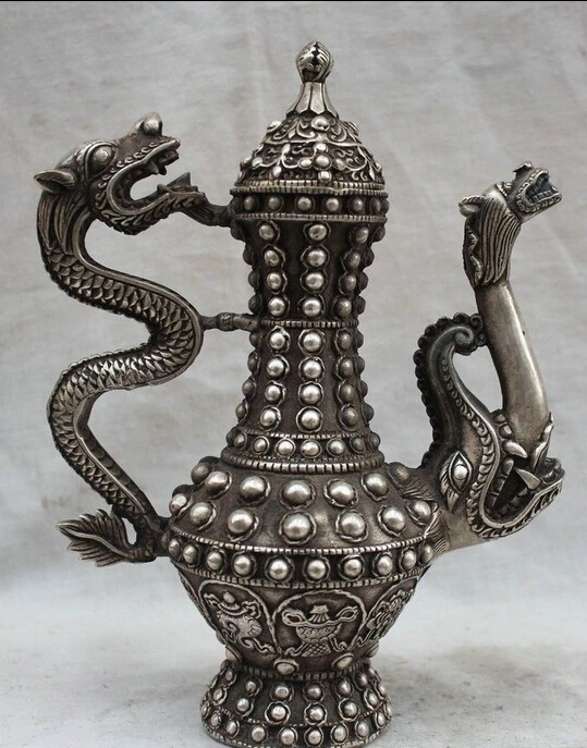 8" Tibet Buddhism Silver Dragon 8 Auspicious Symbol pearl Wine Tea Pot Flagon
8" Tibet Buddhism Silver Dragon 8 Auspicious Symbol pearl Wine Tea Pot Flagon