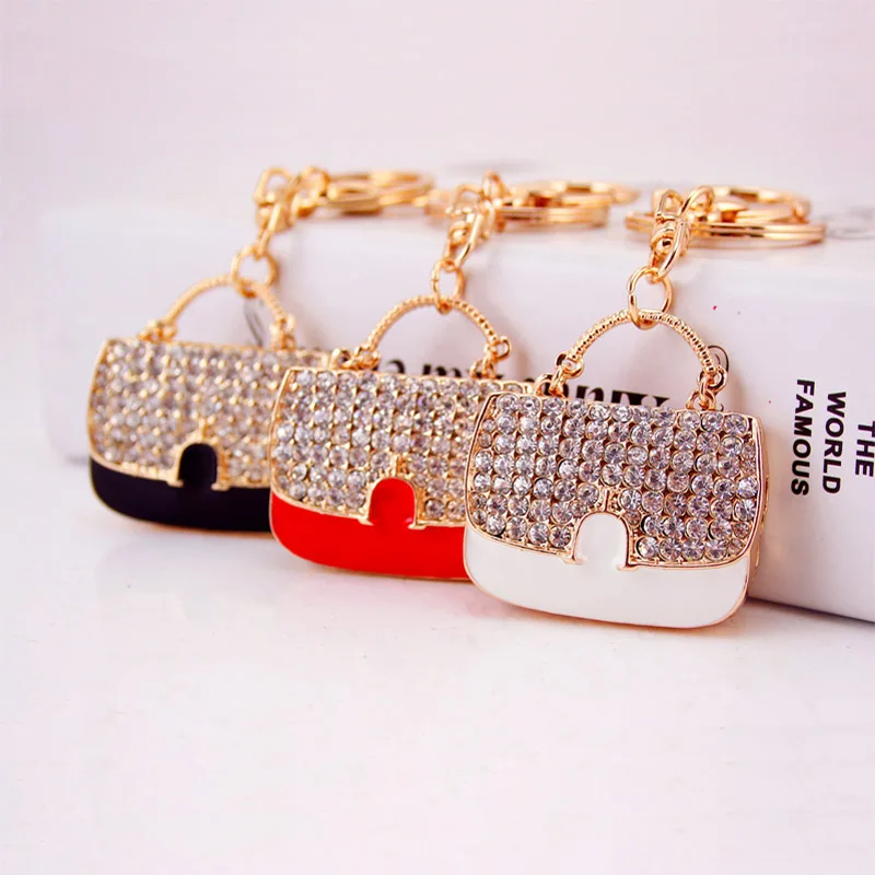Fashion Metal Crystal Handbag Keychain Black White Red 3 Colors Mini Bag Shape Key chain Gold Rhinestone Key Chain Charm
Fashion Metal Crystal Handbag Keychain Black White Red 3 Colors Mini Bag Shape Key chain Gold Rhinestone Key Chain Charm