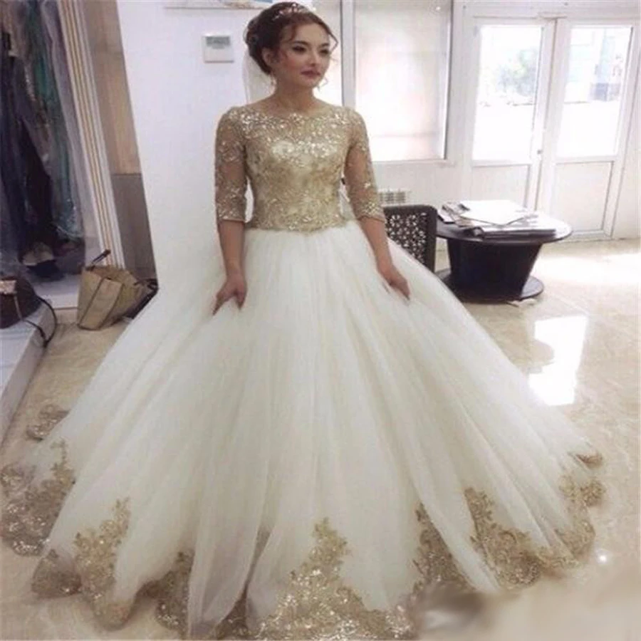 Half Sleeve Lace Appliques Organza Golden Sequin Lace Ball Gown Dubai Wedding Dress New 2019 Tulle Vintage Bride Dress W0346
Half Sleeve Lace Appliques Organza Golden Sequin Lace Ball Gown Dubai Wedding Dress New 2019 Tulle Vintage Bride Dress W0346