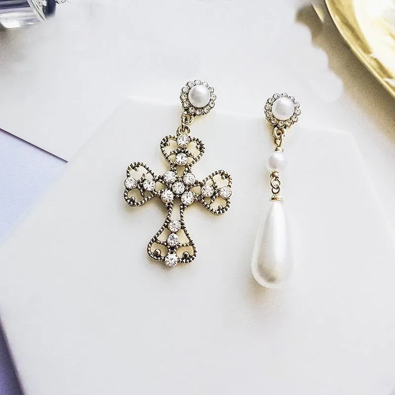 XIAO YOUNG 925 Silver Needel Vintage Asymmetry Cross Simulated Pearl Rhinestone Drop Earring Fashion Jewelry For Women Gift
XIAO YOUNG 925 Silver Needel Vintage Asymmetry Cross Simulated Pearl Rhinestone Drop Earring Fashion Jewelry For Women Gift