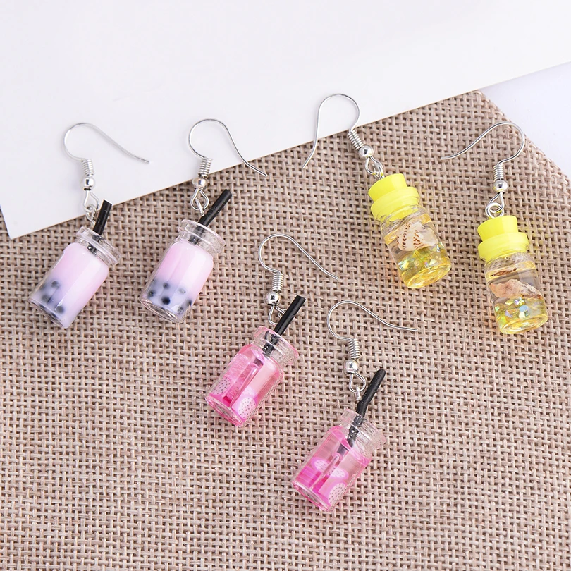 Lovely Fruit Milk Tea Drink Charm Bottle Resin Drop Earrings Fashion Candy Color Yellow Lemon Cup Dangle Earring for Women Hot
Lovely Fruit Milk Tea Drink Charm Bottle Resin Drop Earrings Fashion Candy Color Yellow Lemon Cup Dangle Earring for Women Hot