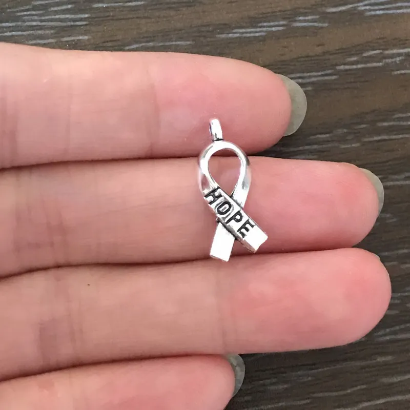 20PCS Bohemian Cancer Hope Ribbon Charm Antique Silver Tone Cancer Awareness Pendant Charm for Bracelet Necklace Earring Jewelry
20PCS Bohemian Cancer Hope Ribbon Charm Antique Silver Tone Cancer Awareness Pendant Charm for Bracelet Necklace Earring Jewelry