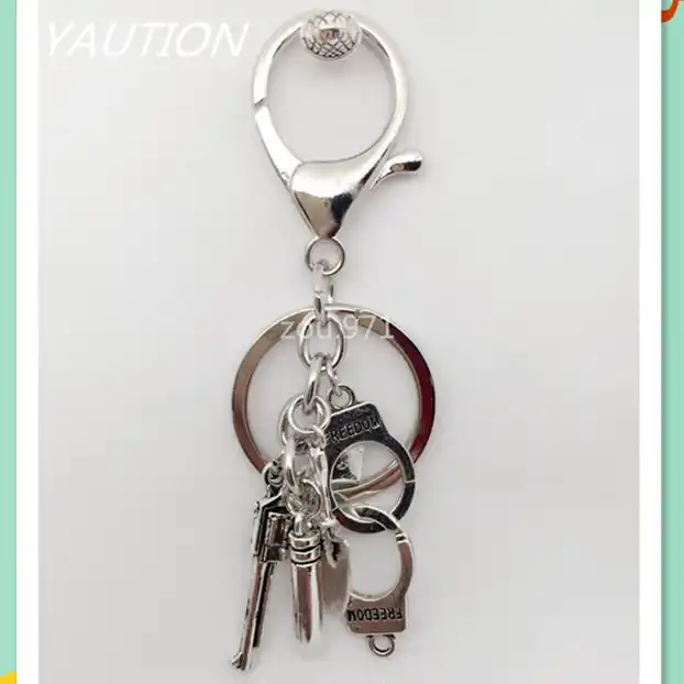 new fashion creative pistol handcuffs keychain badge emblem