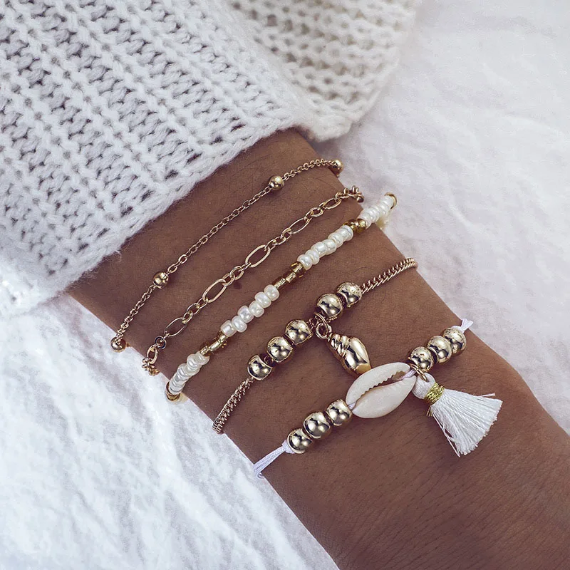 5 Pcs/Set Sea Snail Shell Charm Bracelet Set for Women Gold Link Chain Shell Charm Bracelet Boho Statement Braclets for Women 
5 Pcs/Set Sea Snail Shell Charm Bracelet Set for Women Gold Link Chain Shell Charm Bracelet Boho Statement Braclets for Women
