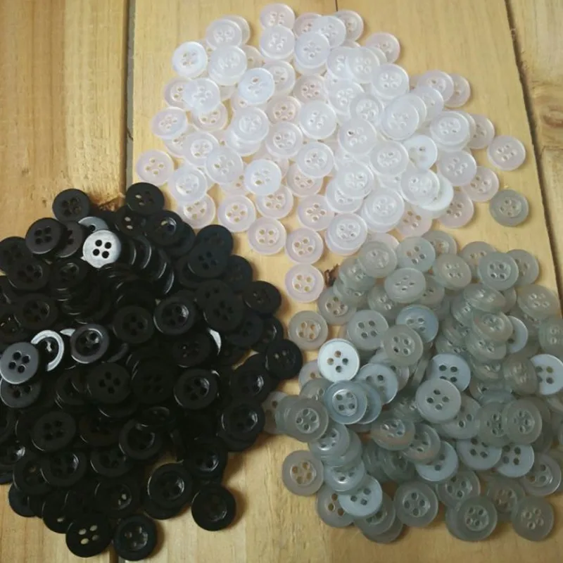 50PCS , 11 mm White Round decorative button 4 holes Black children grey sewing buttons
50PCS , 11 mm White Round decorative button 4 holes Black children grey sewing buttons