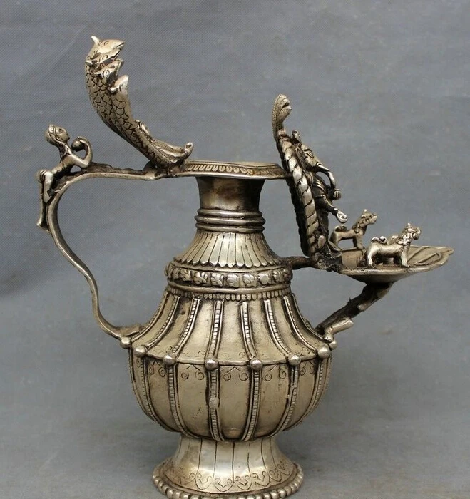 Free Shipping 12"Tibet Silver Buddhist Ganesh Lord Ganesha Buddha Statue Teapot Shape Pot Vase
Free Shipping 12"Tibet Silver Buddhist Ganesh Lord Ganesha Buddha Statue Teapot Shape Pot Vase