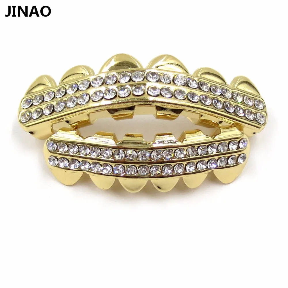 JINAO Gold Color Plated 2 ROWS ICED OUT CZ Teeth GRILLZ Top Bottom Tooth Caps Hip Hop Bling NEW Gold shiny Grills Sets
JINAO Gold Color Plated 2 ROWS ICED OUT CZ Teeth GRILLZ Top Bottom Tooth Caps Hip Hop Bling NEW Gold shiny Grills Sets