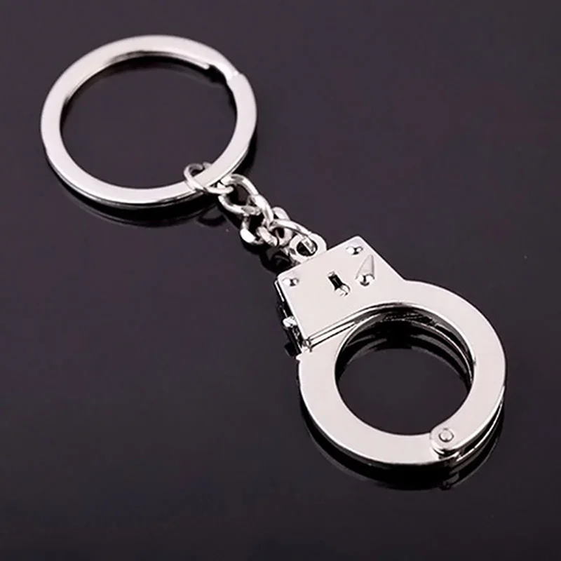 Сувенир-брелок наручники красные Р93а - Подиум - Подарки - Купить