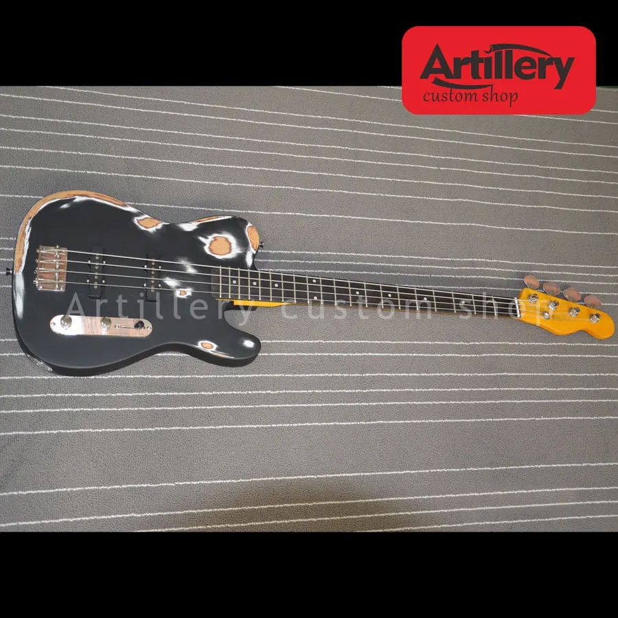 Artillery factory custom TELE bass guitar handmade do old 4 strings guitar with ebony fingerboard musical instrument shop
Artillery factory custom TELE bass guitar handmade do old 4 strings guitar with ebony fingerboard musical instrument shop