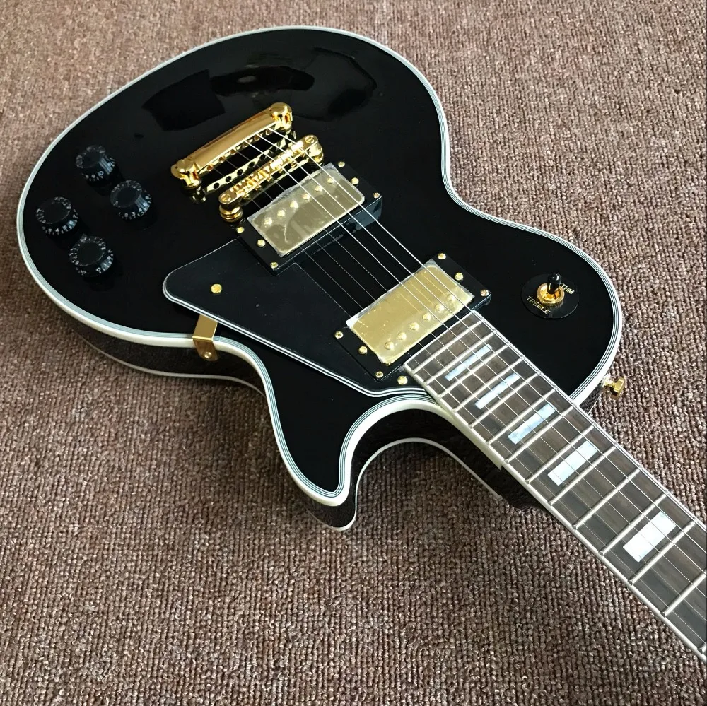 Guitar recording video appreciation Chinese factory OEM mahogany black electric guitar gold hardware Real photo shows,
Guitar recording video appreciation Chinese factory OEM mahogany black electric guitar gold hardware Real photo shows,