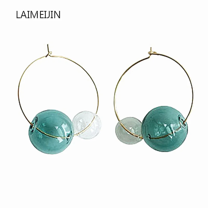 Gold Color Hoop Earrings Fresh Fairy Hollow Transparent Glass Ball Big Round Circle Earrings For Women New Fashion Jewelry Gifts
Gold Color Hoop Earrings Fresh Fairy Hollow Transparent Glass Ball Big Round Circle Earrings For Women New Fashion Jewelry Gifts