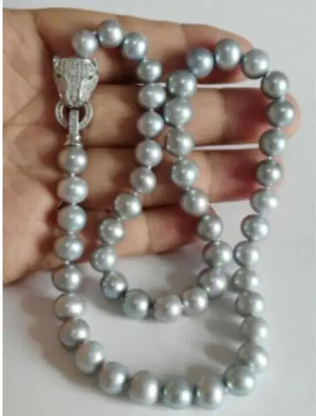 Hot selling free shipping****elegant 10-11mm south sea round silver grey pearl necklace
Hot selling free shipping****elegant 10-11mm south sea round silver grey pearl necklace