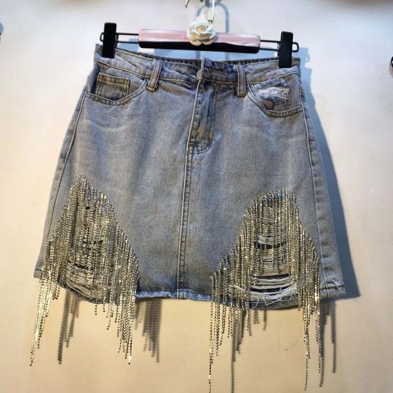 European Women Skirts Blue Denim 2019 New Rhinestone Drilled High Waist Hole Jean Skirt Tassel Sexy Short Mini Skirts Girls Lady
European Women Skirts Blue Denim 2019 New Rhinestone Drilled High Waist Hole Jean Skirt Tassel Sexy Short Mini Skirts Girls Lady