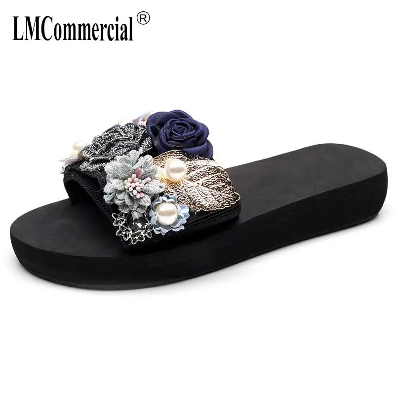 Sandals female summer wear fashion high heel thick bottom one word anti-slip flower color matching slope sandals beach slippers
Sandals female summer wear fashion high heel thick bottom one word anti-slip flower color matching slope sandals beach slippers