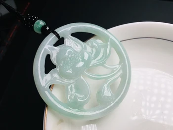 Natural old pit yu handmade ice bottom with green one green lotus yu pendant jewelry
Natural old pit yu handmade ice bottom with green one green lotus yu pendant jewelry