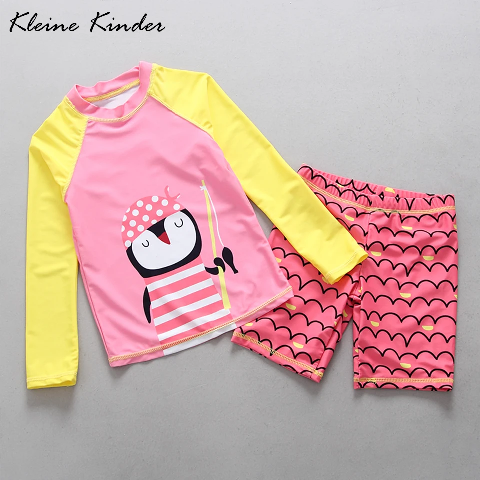 3-15 years children swimwear penguin print long sleeve rash guard + swimming trunks for girls UV block beach wear bathing suit 
3-15 years children swimwear penguin print long sleeve rash guard + swimming trunks for girls UV block beach wear bathing suit