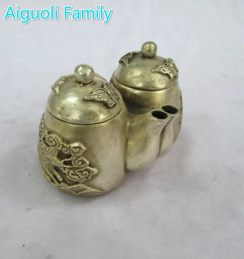 Art collection old chinese handmade tibet silver Double mouth tea pot/metal teapot craft for home decoration
Art collection old chinese handmade tibet silver Double mouth tea pot/metal teapot craft for home decoration