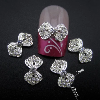 YNS098 Silver New bows design decorations for nails 3d alloy nail art supplies 50pcs
YNS098 Silver New bows design decorations for nails 3d alloy nail art supplies 50pcs