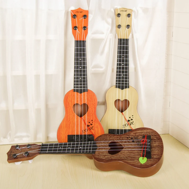 Baby trumpet simulation instrument mini four string can play enlightenment early education music guitar educational toys
Baby trumpet simulation instrument mini four string can play enlightenment early education music guitar educational toys