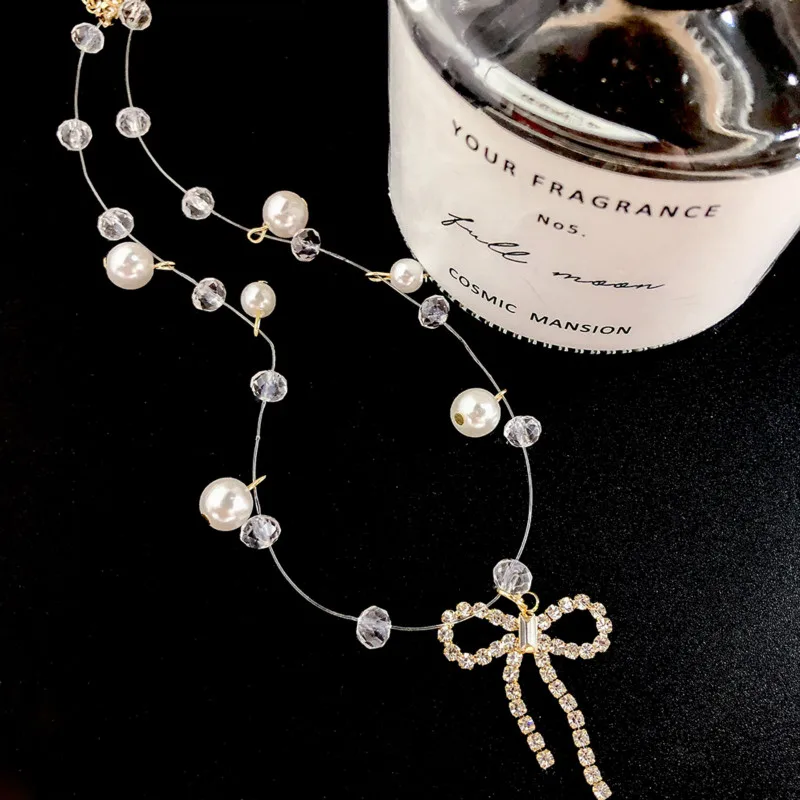 New Classic Fashionable Clavicle Chain Cold Wind Retro Pearl Bow Necklace Lady Fishline Pearl Crystal Necklace
New Classic Fashionable Clavicle Chain Cold Wind Retro Pearl Bow Necklace Lady Fishline Pearl Crystal Necklace