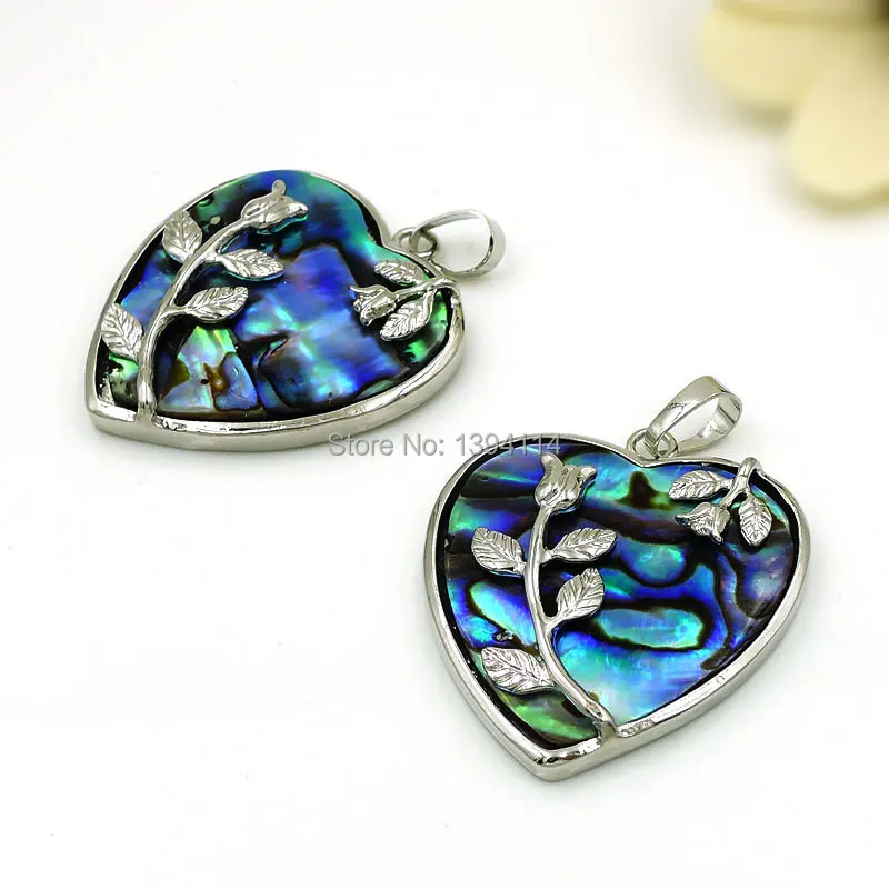 Abalone Shell Heart Pendant With Copper Flower Setting Silver Plated Approx 37*32 mm
Abalone Shell Heart Pendant With Copper Flower Setting Silver Plated Approx 37*32 mm