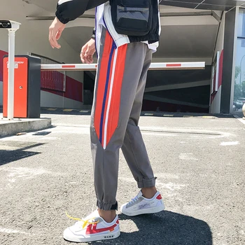 2018 Autumn New Men's Fashion Tide Splice Color Stripe Pattern Bound Feet Ankle-Length Pants Elastic Waist Casual Trousers M-2XL 
2018 Autumn New Men's Fashion Tide Splice Color Stripe Pattern Bound Feet Ankle-Length Pants Elastic Waist Casual Trousers M-2XL
