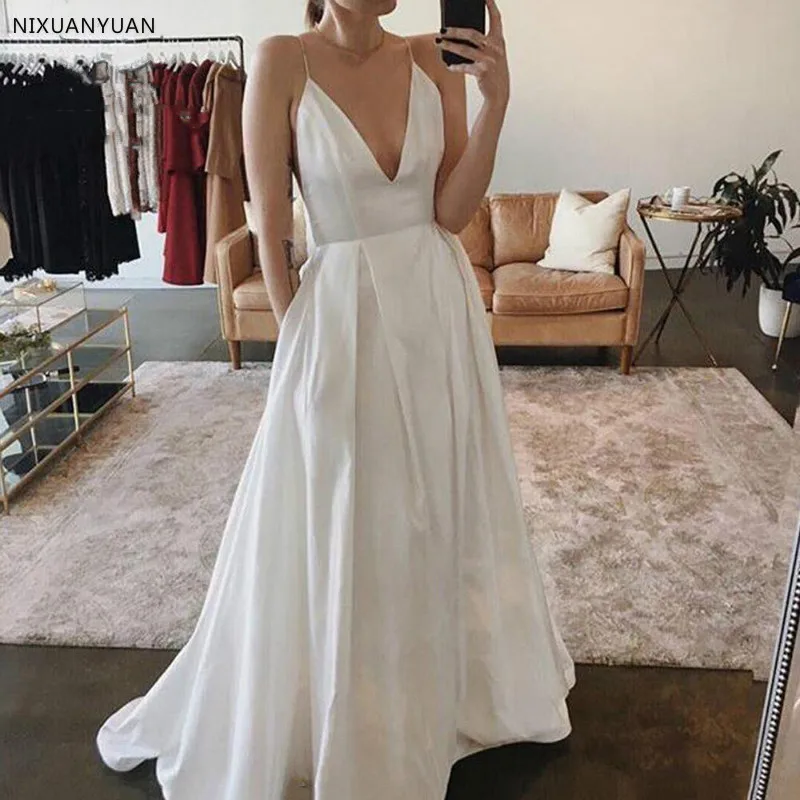 Spaghetti Straps V Neck Wedding Dresses A Line Open Back Sweep Train Sleeveless Formal Bridal Dress with Pocket Vestido De Noiva
Spaghetti Straps V Neck Wedding Dresses A Line Open Back Sweep Train Sleeveless Formal Bridal Dress with Pocket Vestido De Noiva