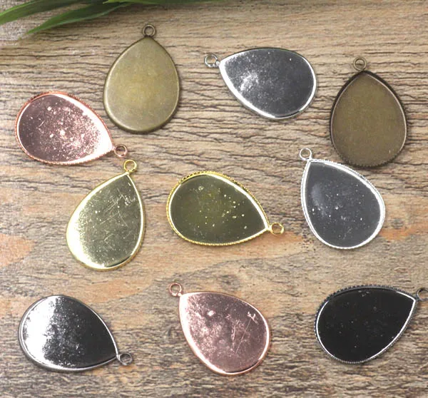 Multi-color Teardrop Pendant Setting Blank Resin Cabochons Bases Tray Bezel with Loop 13x18mm 18x25mm for DIY Jewelry Findings
Multi-color Teardrop Pendant Setting Blank Resin Cabochons Bases Tray Bezel with Loop 13x18mm 18x25mm for DIY Jewelry Findings