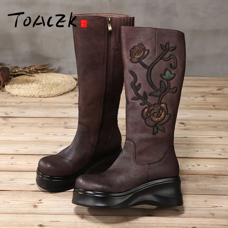 Autumn winter new thick - bottomed leather high boots female genuine leather national wind flower slope heel long boots
Autumn winter new thick - bottomed leather high boots female genuine leather national wind flower slope heel long boots