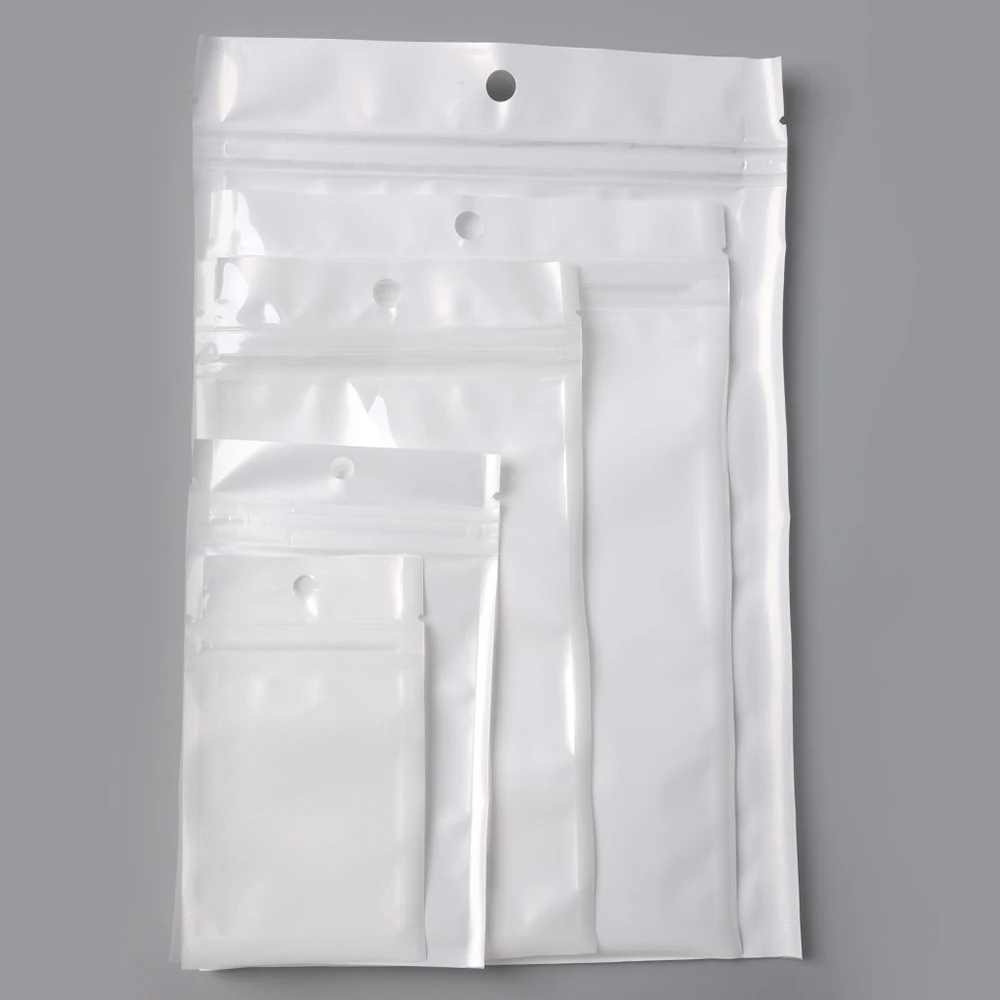 50/100pcs Self Seal Zipper Plastic Packaging Bag White/Clear Pearling Zip Lock Storage Bag Hang Hole Bag For Food/Crafts Package 
50/100pcs Self Seal Zipper Plastic Packaging Bag White/Clear Pearling Zip Lock Storage Bag Hang Hole Bag For Food/Crafts Package