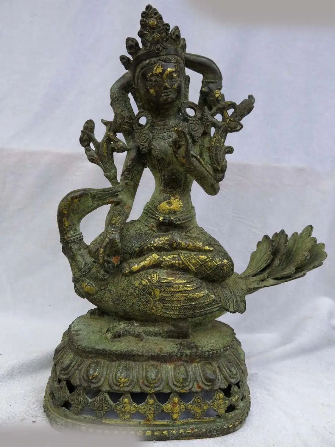 12" China old bronze gild sculpture carved buddhism duck Four-arm buddha statue
12" China old bronze gild sculpture carved buddhism duck Four-arm buddha statue