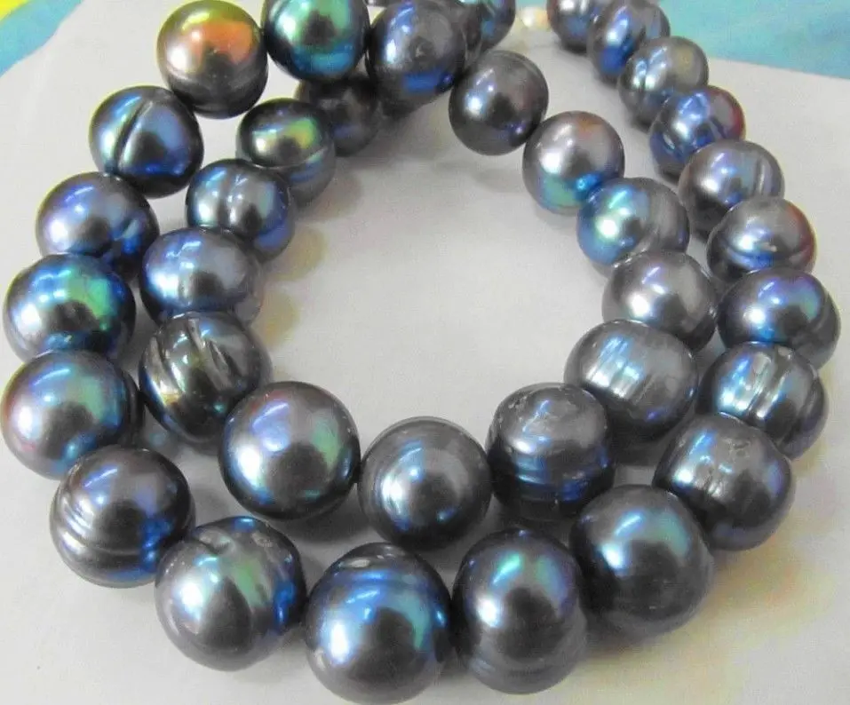 Wholesale FREE SHIPPING 18'' HUGE SOUTH SEA 11-13MM BLACK BAROQUE PEARL NECKLCE 14KGP GOLD CLASP
Wholesale FREE SHIPPING 18'' HUGE SOUTH SEA 11-13MM BLACK BAROQUE PEARL NECKLCE 14KGP GOLD CLASP