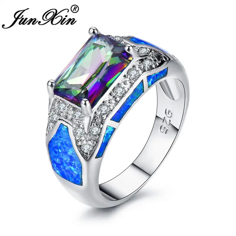 JUNXIN 2019 Fashion Mystic Fire Birthstone Wedding Rings For Women Men 925 Sterling Silver Purple CZ Blue White Fire Opal Ring
JUNXIN 2019 Fashion Mystic Fire Birthstone Wedding Rings For Women Men 925 Sterling Silver Purple CZ Blue White Fire Opal Ring
