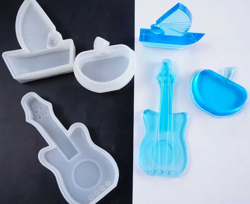 1PC Sailboat Guitar Apple Shaped Jewelry Tool Jewelry Mold UV Epoxy Resin Silicone Molds for Making Jewelry
1PC Sailboat Guitar Apple Shaped Jewelry Tool Jewelry Mold UV Epoxy Resin Silicone Molds for Making Jewelry