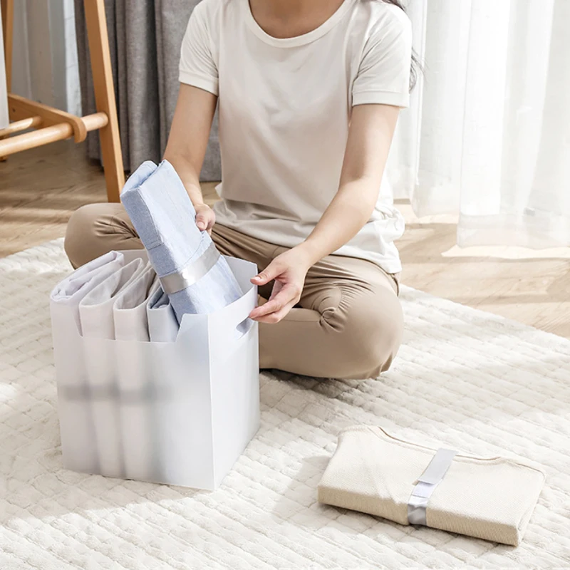 Factory direct sales lazy folding plate template T-shirt shirt storage box folding clothes storage container household supplies
Factory direct sales lazy folding plate template T-shirt shirt storage box folding clothes storage container household supplies