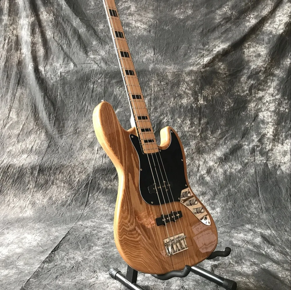 Newest high quality 4-Strings Handmade jazz Electric Bass Guitar,Natural wood color guitarra.real photo
Newest high quality 4-Strings Handmade jazz Electric Bass Guitar,Natural wood color guitarra.real photo