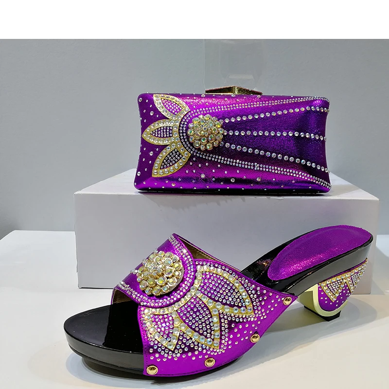 The newly launched purple Italian women's shoes and slippers matching set and bag cover at the Italian popular women's high heel
The newly launched purple Italian women's shoes and slippers matching set and bag cover at the Italian popular women's high heel