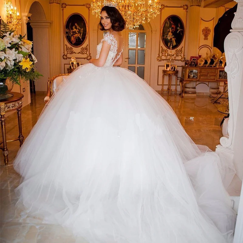 Luxury Princess Wedding Dresses 2019 Cap-Sleeves Appliques Pearls Ball Gowns with Chapel Train for Bride robe de noiva
Luxury Princess Wedding Dresses 2019 Cap-Sleeves Appliques Pearls Ball Gowns with Chapel Train for Bride robe de noiva