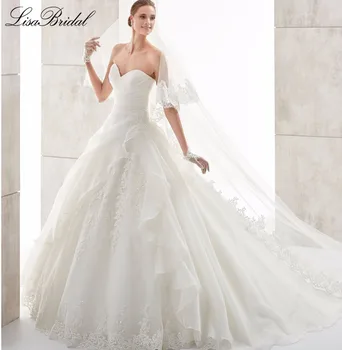 Romantic New Long Wedding Dress 2017 Sweetheart Neck Sleeveless Chapel Train Appliques Tulle Wedding Gowns With Veil Casamento
Romantic New Long Wedding Dress 2017 Sweetheart Neck Sleeveless Chapel Train Appliques Tulle Wedding Gowns With Veil Casamento