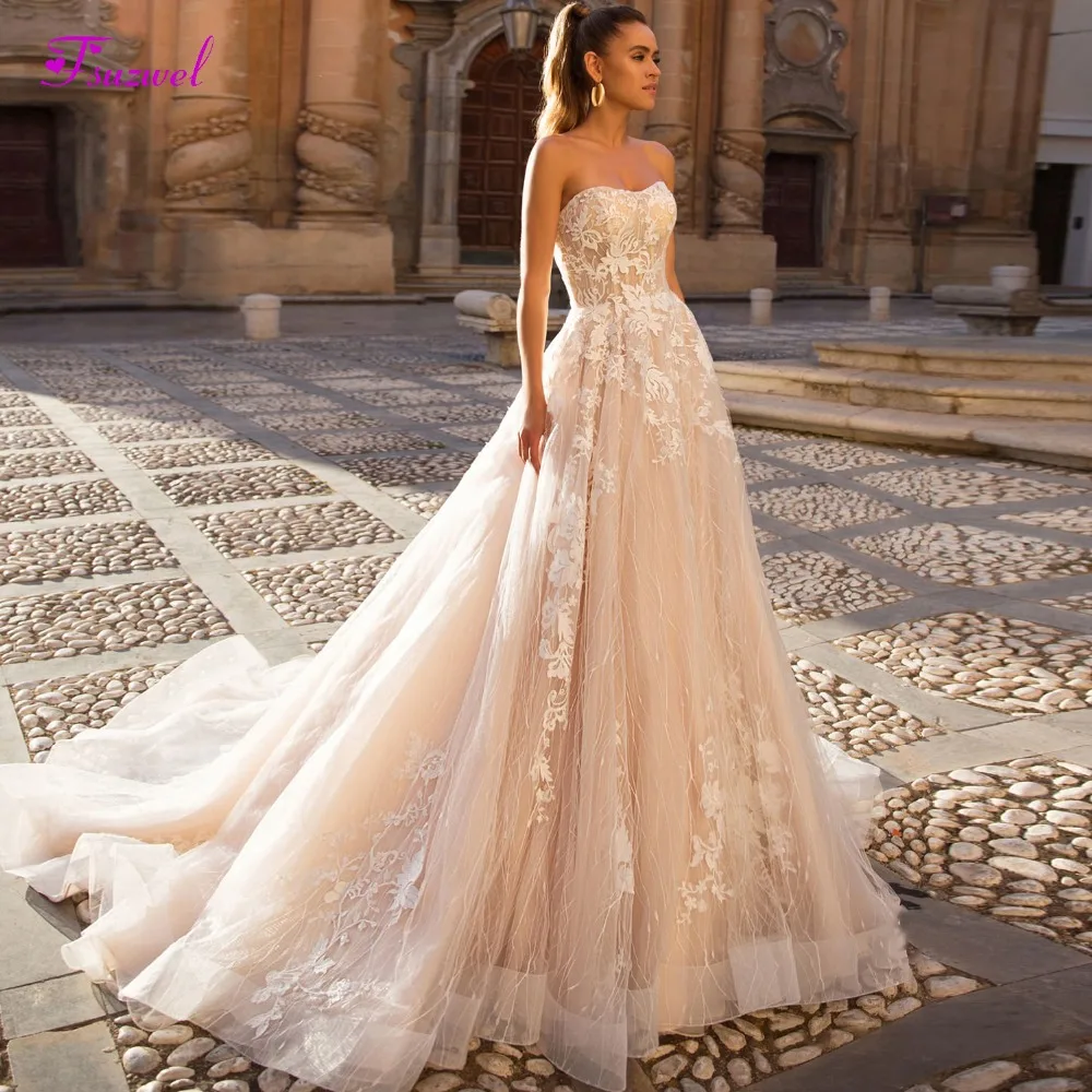 Fsuzwel Sexy Strapless Off the Shoulder A-Line Wedding Dress 2020 Graceful Appliques Lace Princess Bride Gown Vestido de Noiva
Fsuzwel Sexy Strapless Off the Shoulder A-Line Wedding Dress 2020 Graceful Appliques Lace Princess Bride Gown Vestido de Noiva