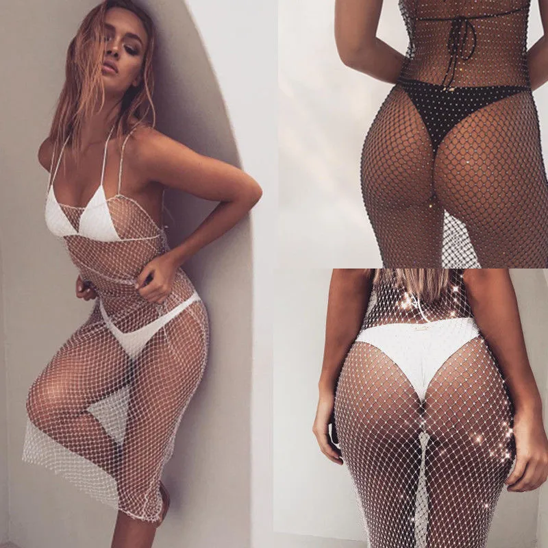 Summer Women Sexy Fishnet Mesh Spaghetti Strap Knitted Crochet Dress Hollow Out Beachwear Holiday Dress See-through Wrap Dress
Summer Women Sexy Fishnet Mesh Spaghetti Strap Knitted Crochet Dress Hollow Out Beachwear Holiday Dress See-through Wrap Dress